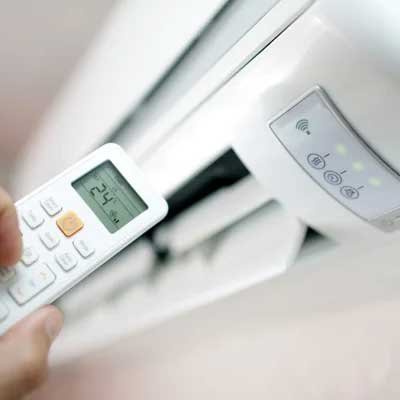 Technician Installing AC Unit
